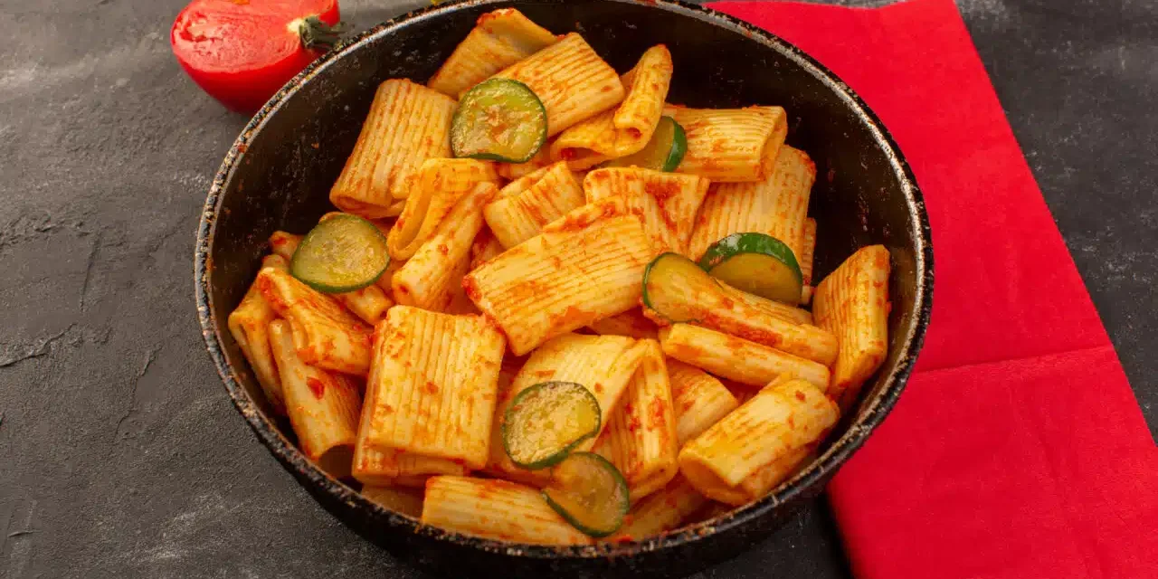 front-view-cooked-italian-pasta-with-tomato-sauce-cucumber-inside-pan-dark-desk-1280×853.jpg