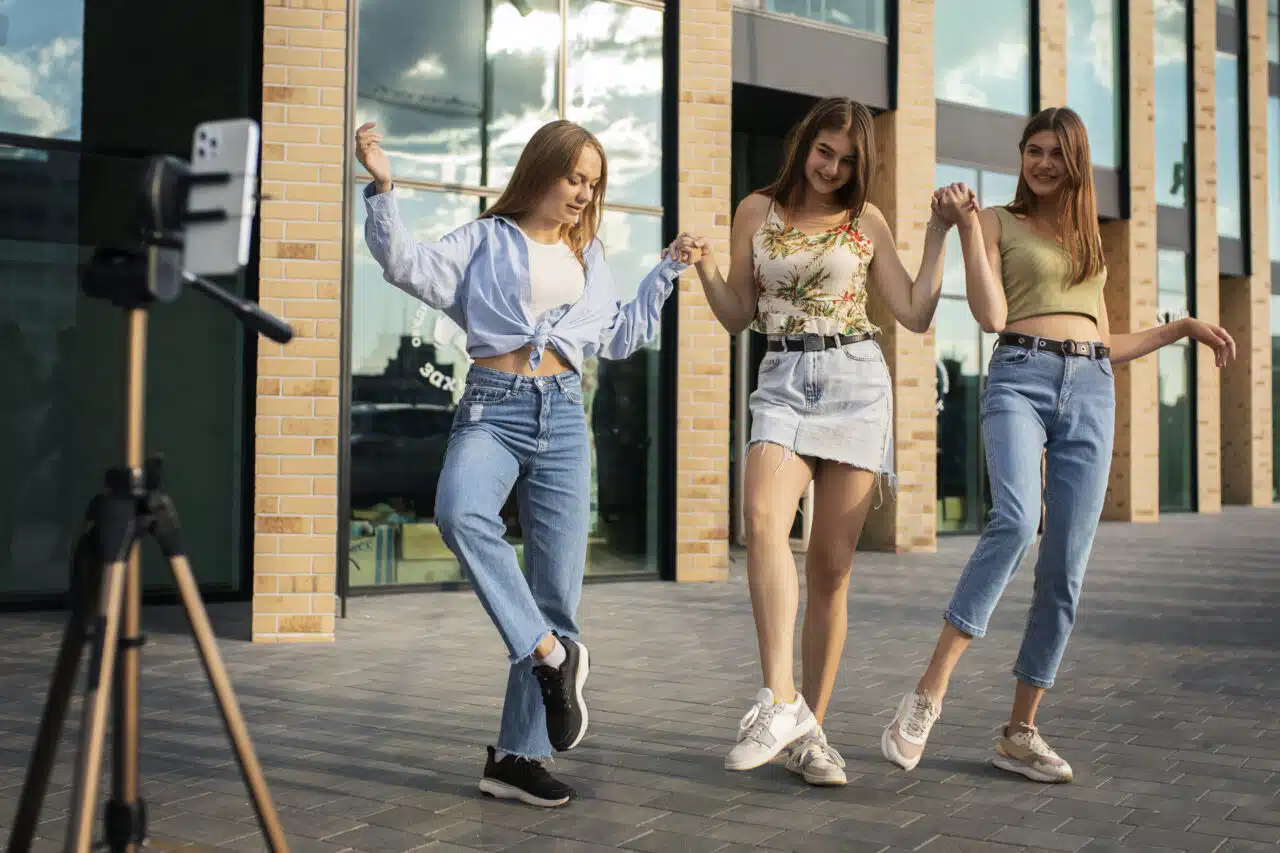 young-teenage-girls-recording-reels-themselves-outdoors-social-media-1280×853.jpg