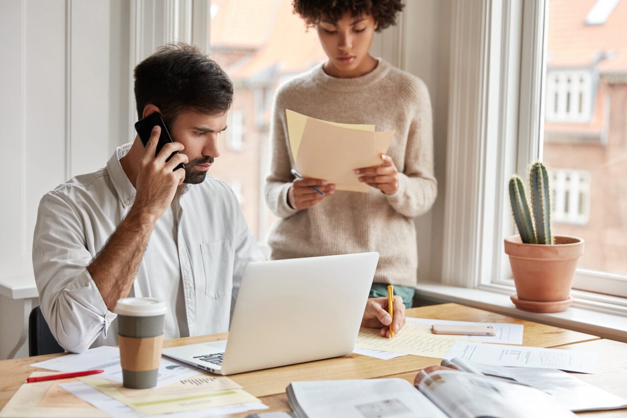 man-woman-colleagues-makes-research-startup-project-pose-near-desktop-1280×853