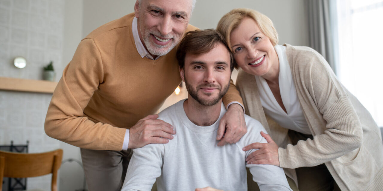 Parents happy to see their son, family looking happy